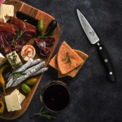 Executive-Plus Serie 4,25" Schälmesser 61 HRC Edelstahl -Haushaltsgeräte Geschäft 10039010 de 0003 logo