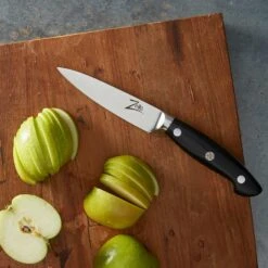 Executive-Plus Serie 4,25" Schälmesser 61 HRC Edelstahl -Haushaltsgeräte Geschäft 10039010 de 0004 logo