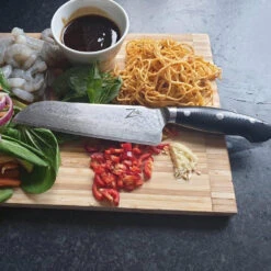 Executive-Plus Serie 7" Santokumesser 61 HRC Damaszenerstahl 9 Executive-Plus Serie 7" Santokumesser 61 HRC Damaszenerstahl -Haushaltsgeräte Geschäft 10039011 de 0004 logo